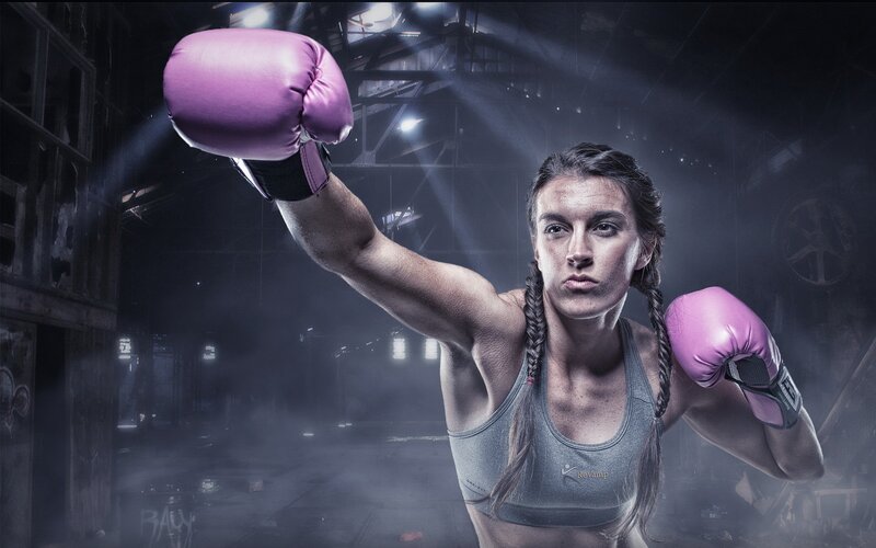 Woman Boxer in Warehouse
