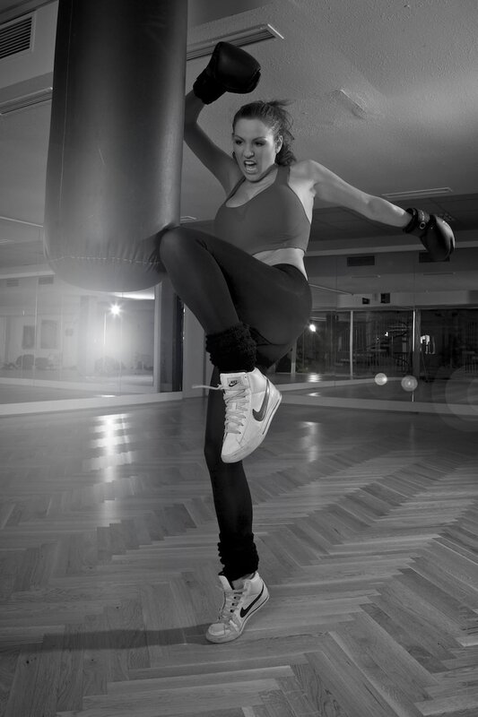 woman boxing in gym