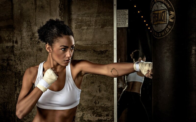 woman boxing in gym
