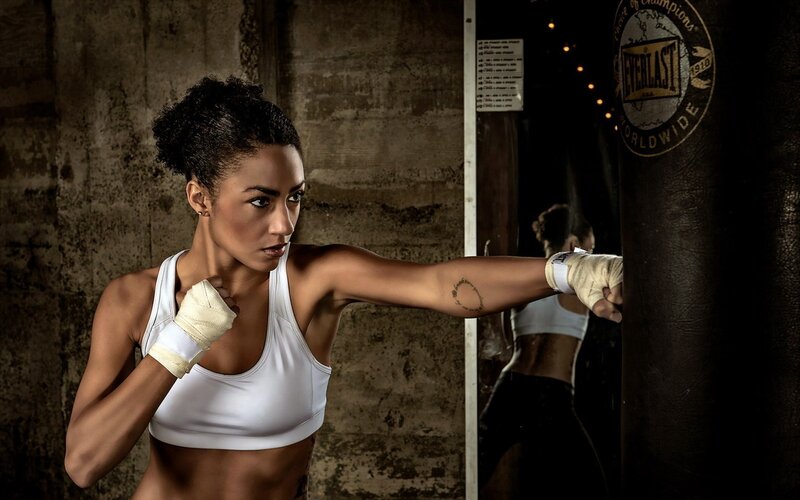 woman boxing in gym