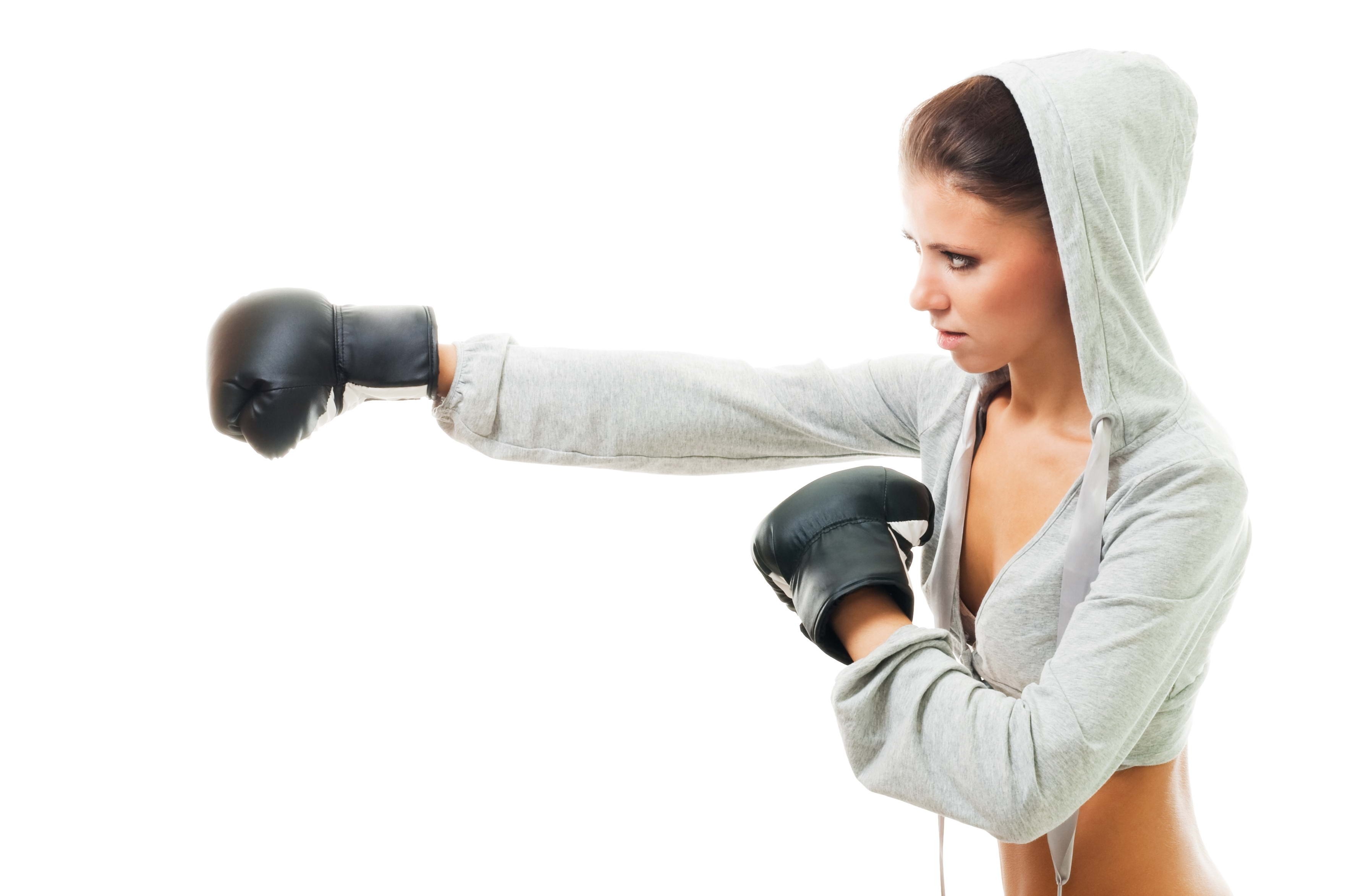 woman boxing in hoodie