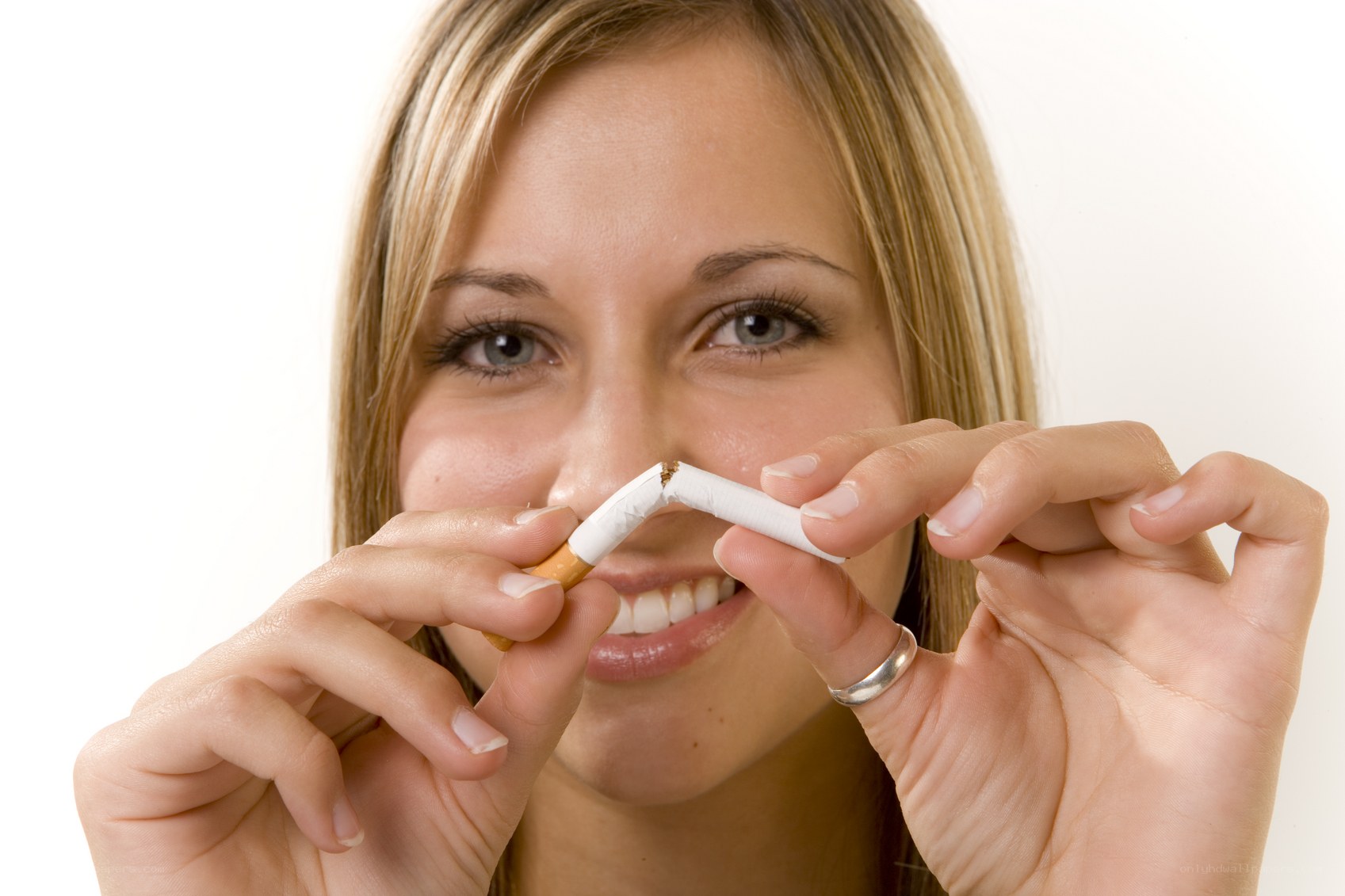 woman breaking a cigarette