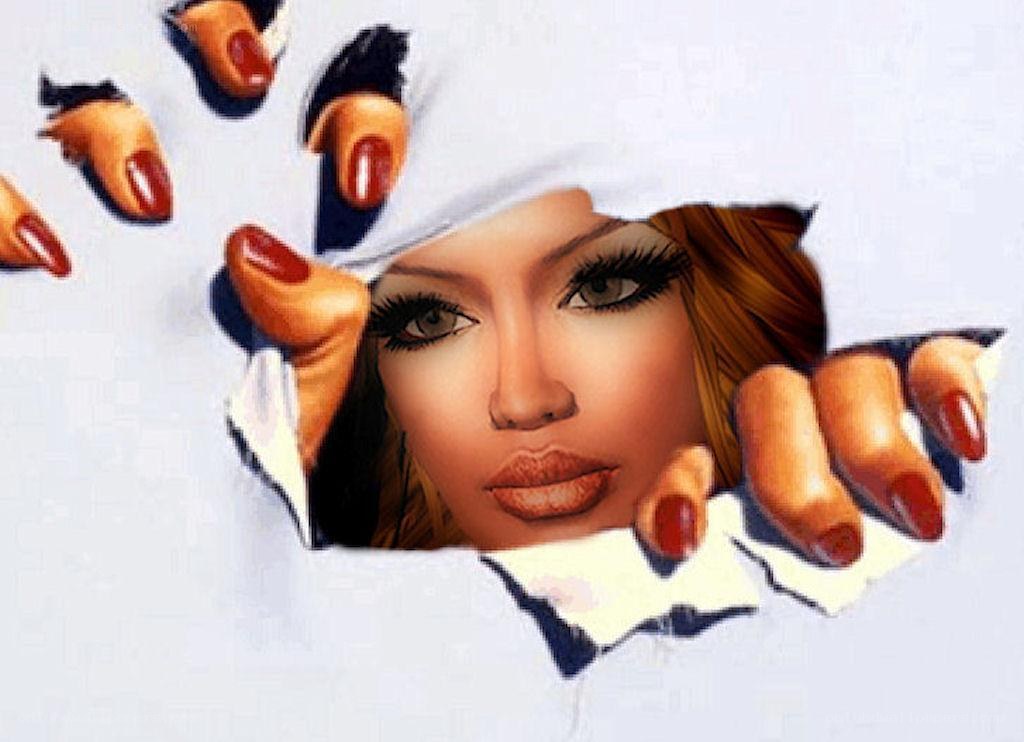 woman breaking through paper
