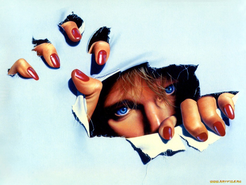 woman breaking through paper