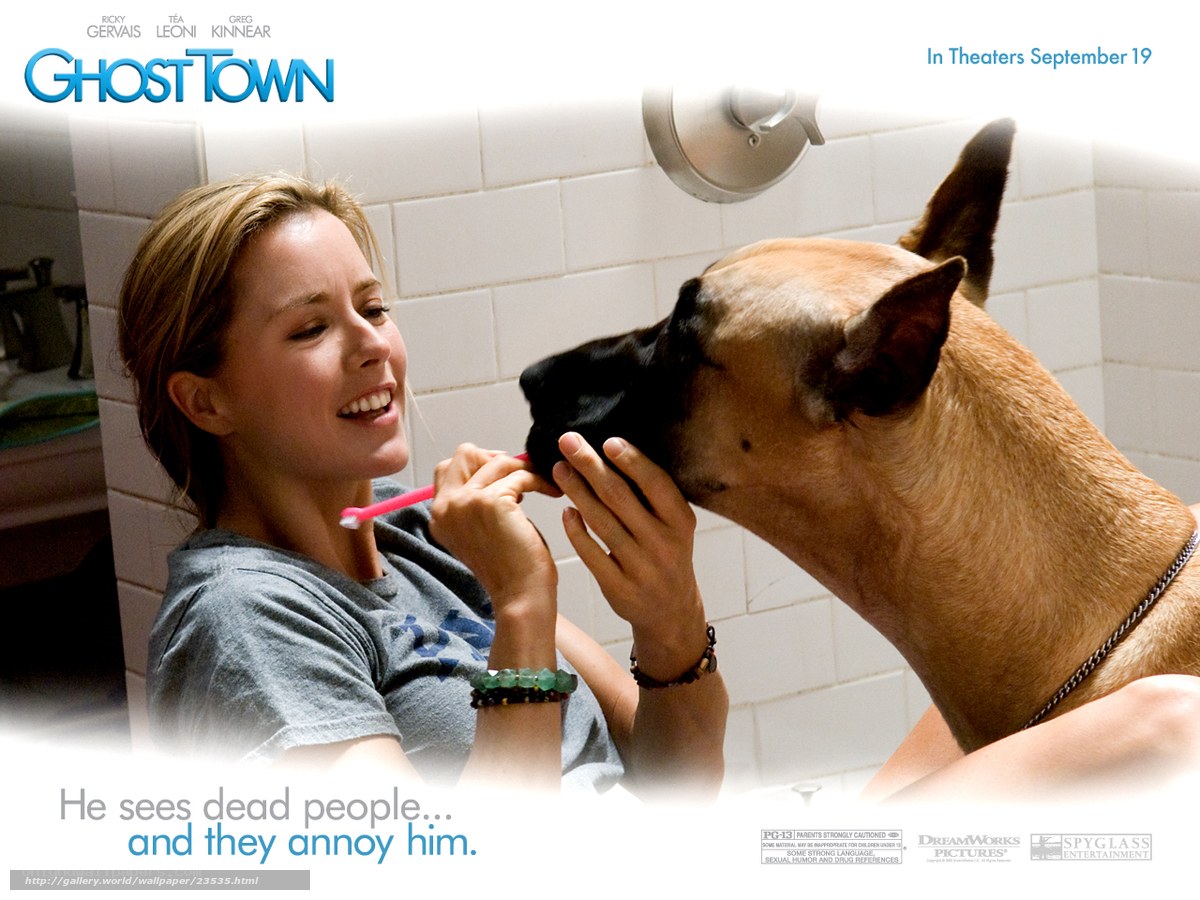 woman brushing dog's teeth