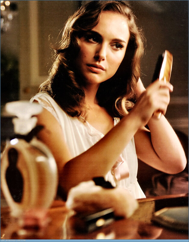 woman brushing hair in mirror