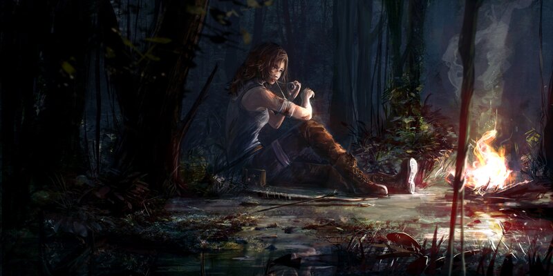 Woman by a campfire in the forest