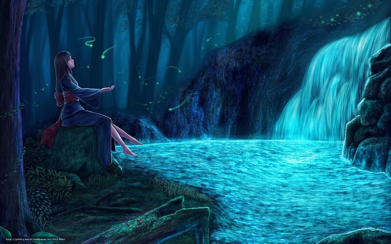Woman by a glowing waterfall