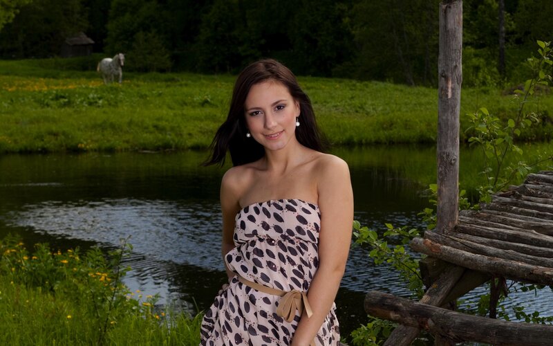 Woman by a pond in nature