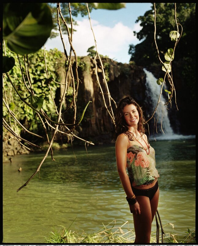 Woman by a waterfall