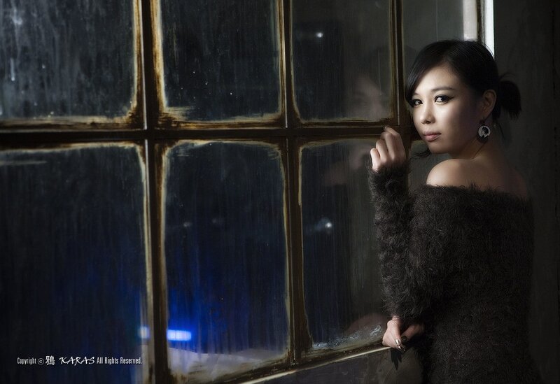 woman by a window