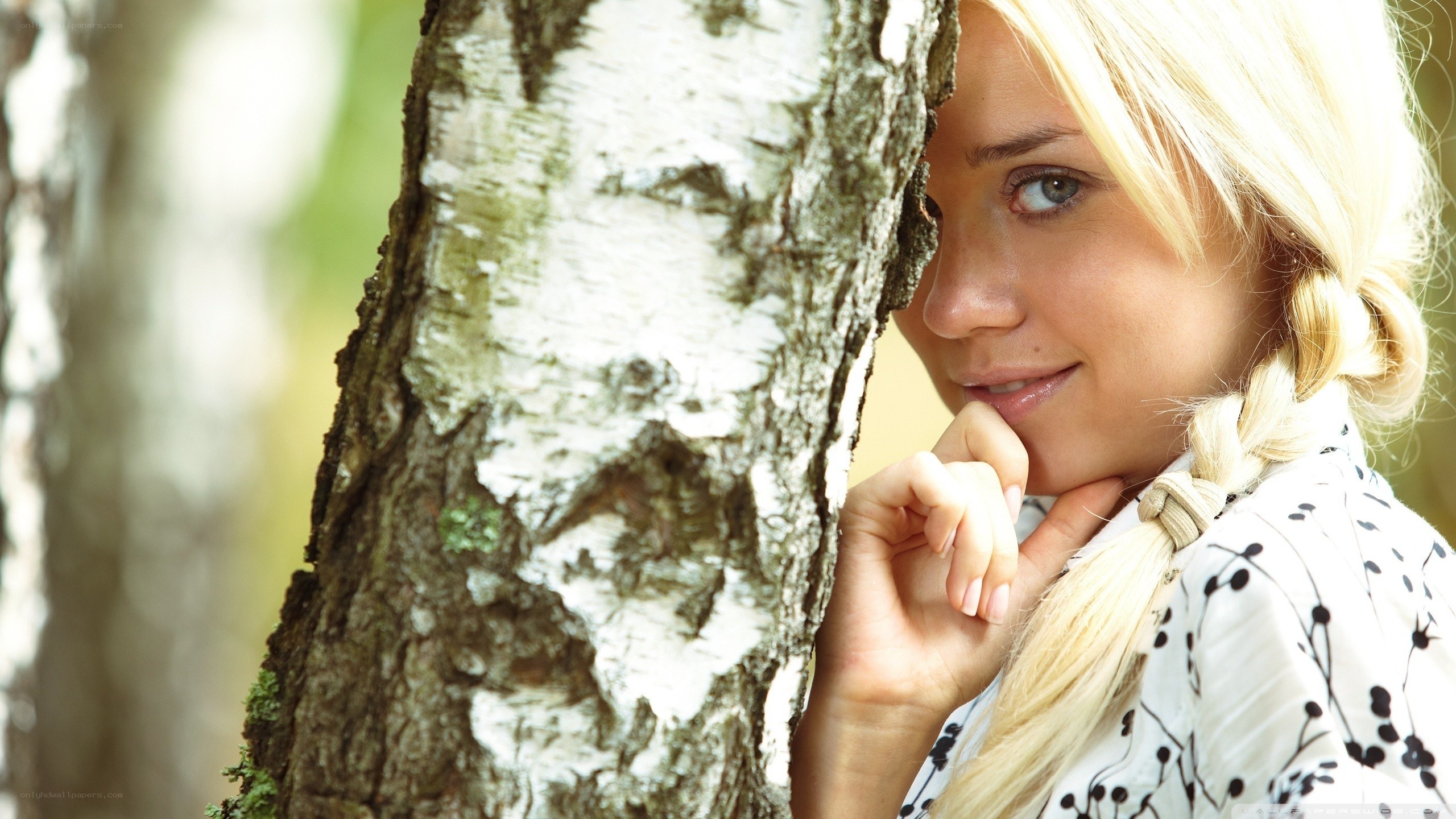 woman by birch tree