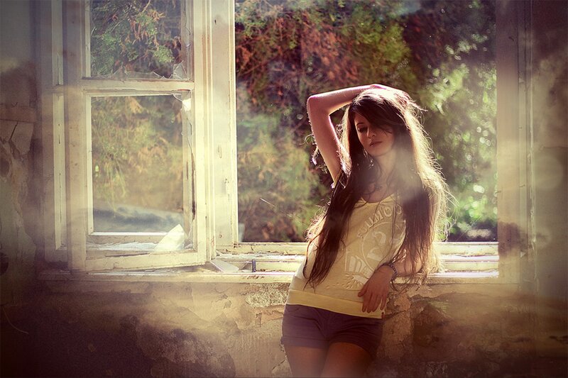 woman by broken window