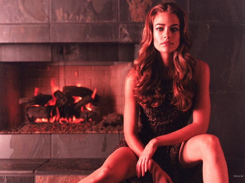 woman by the fireplace