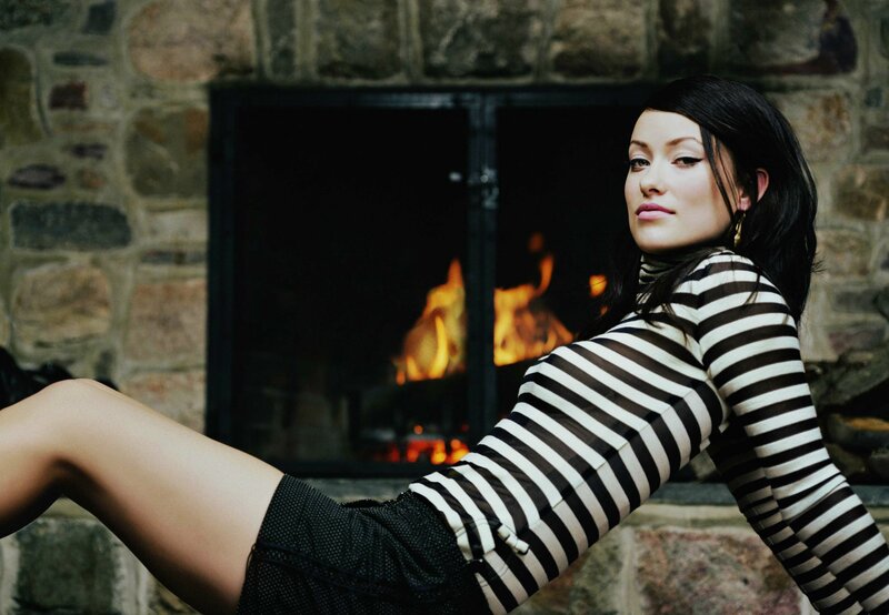 woman by the fireplace