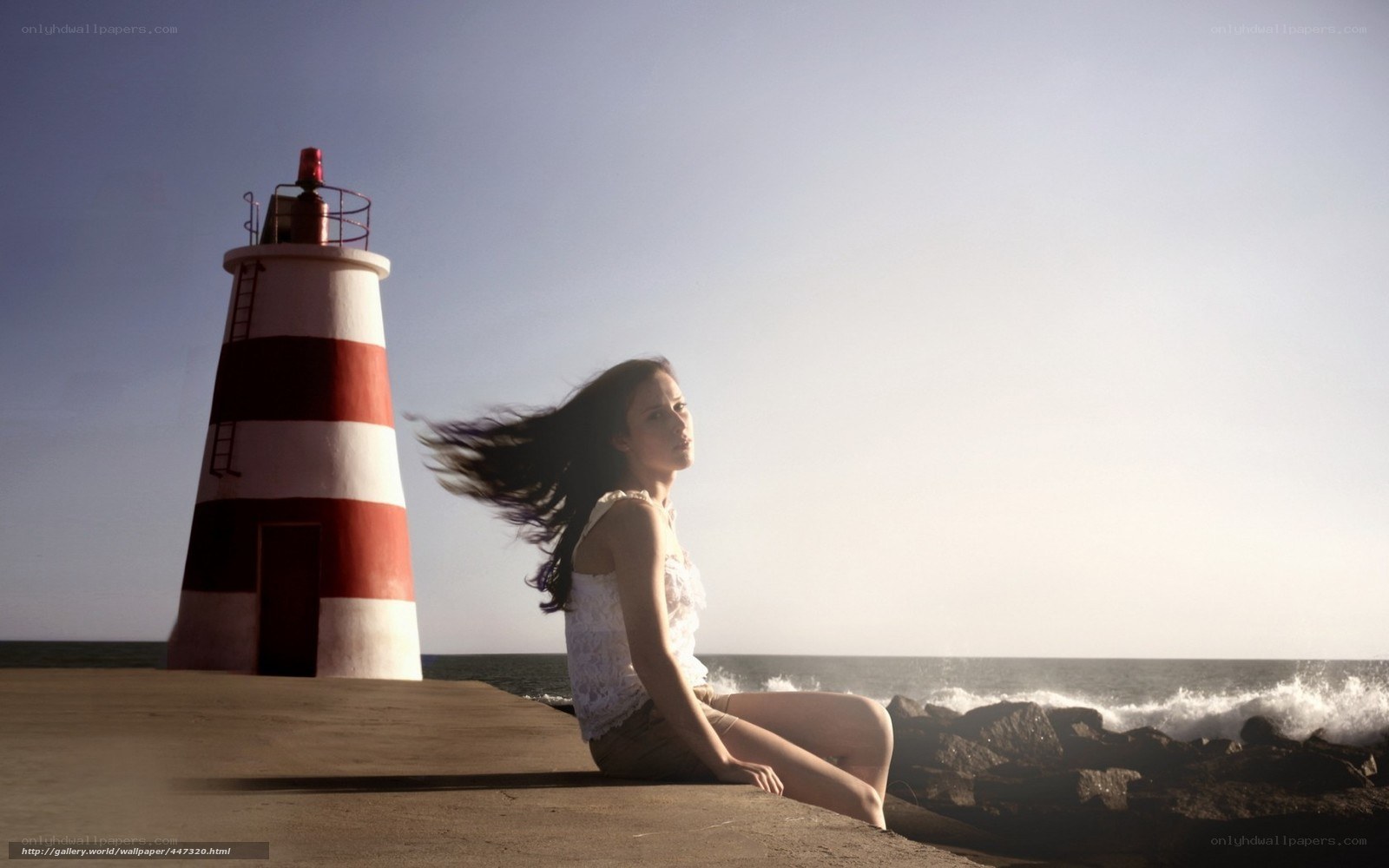 Woman by the lighthouse