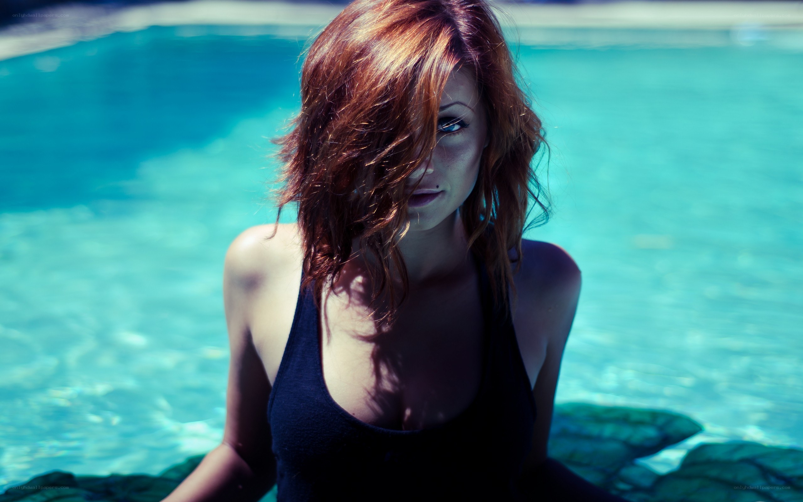 woman by the pool