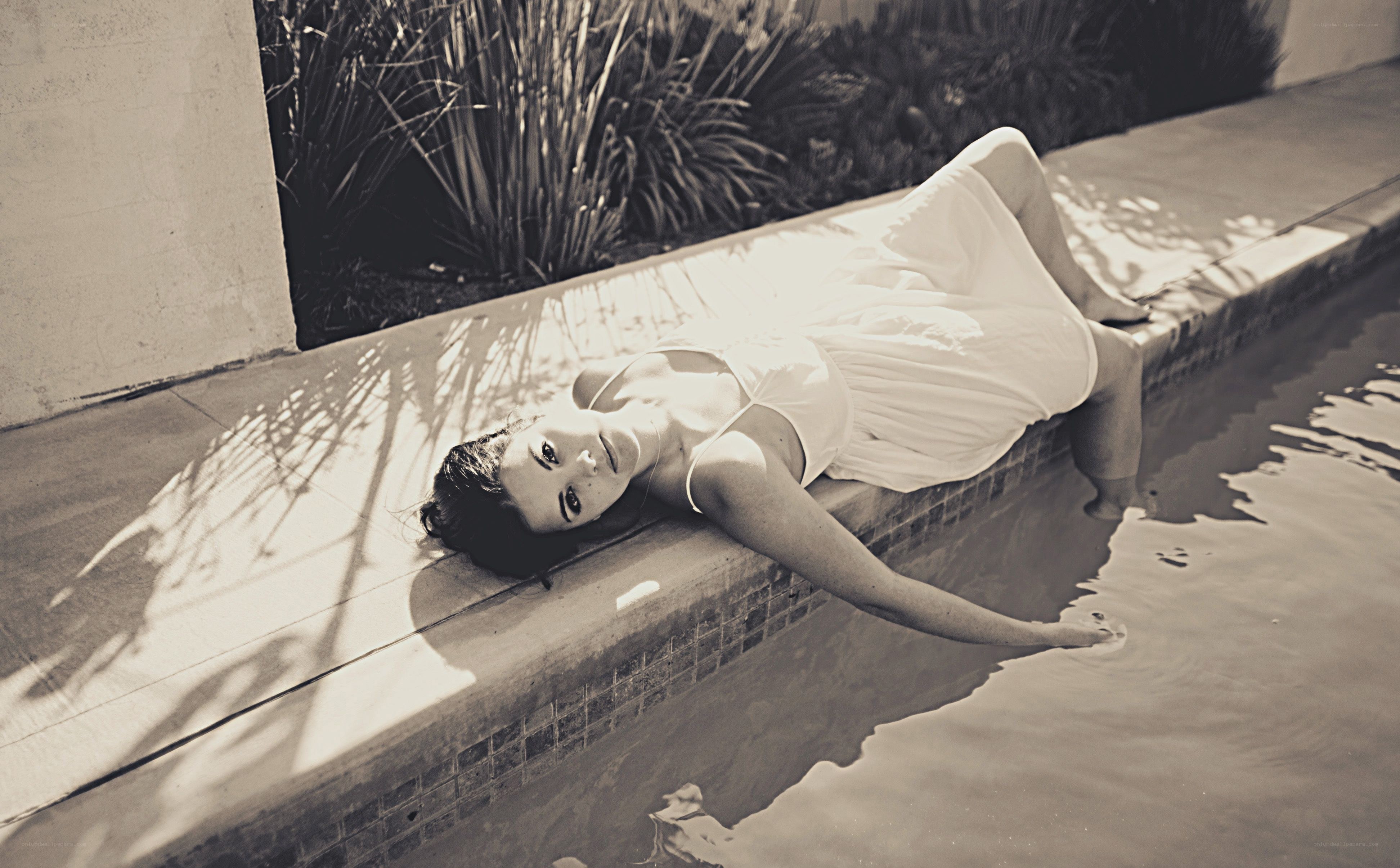 woman by the poolside