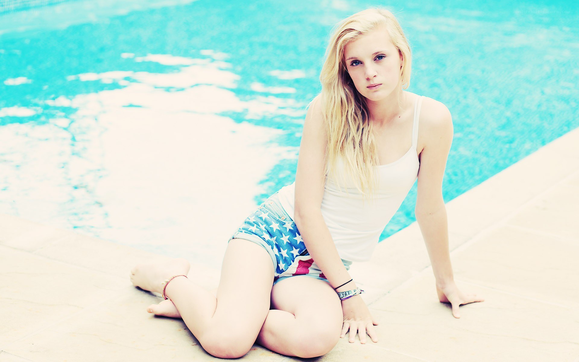 woman by the poolside