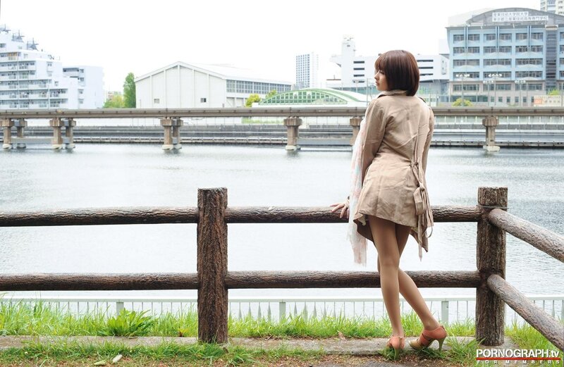 Woman by the riverbank