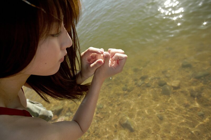 woman by the water's edge