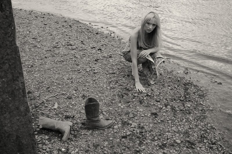 woman by the water's edge