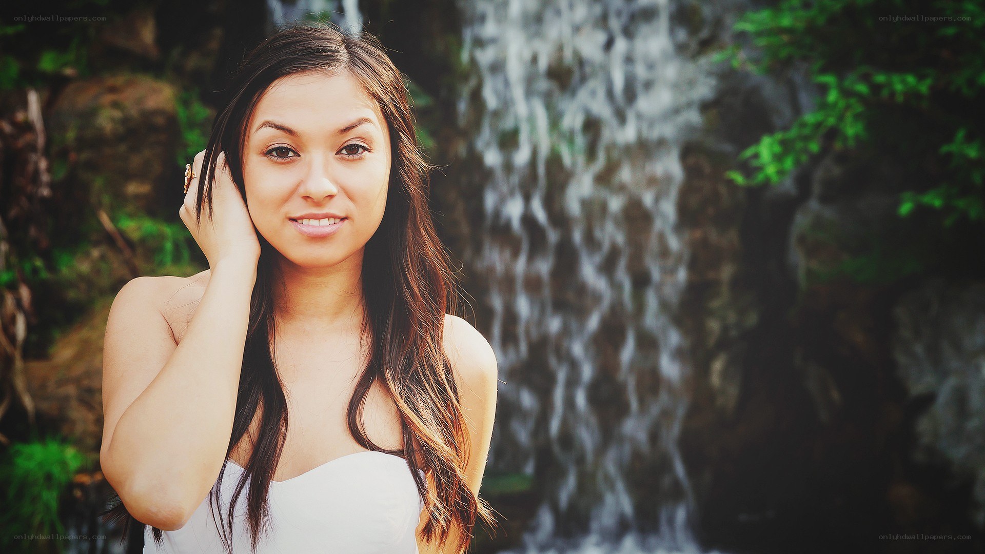 woman by waterfall