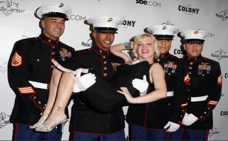Woman Carried by Soldiers