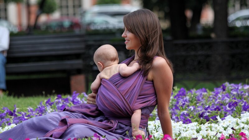 Woman Carrying Baby in Sling — Purple