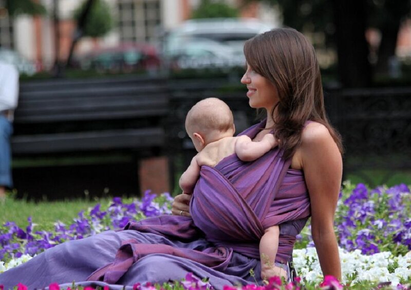 Woman Carrying Baby