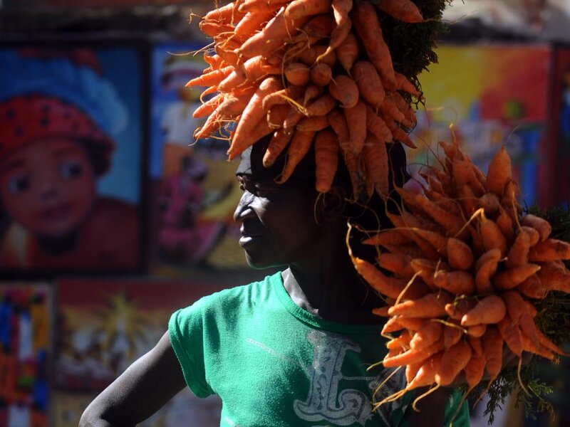 Woman Carrying Carrots
