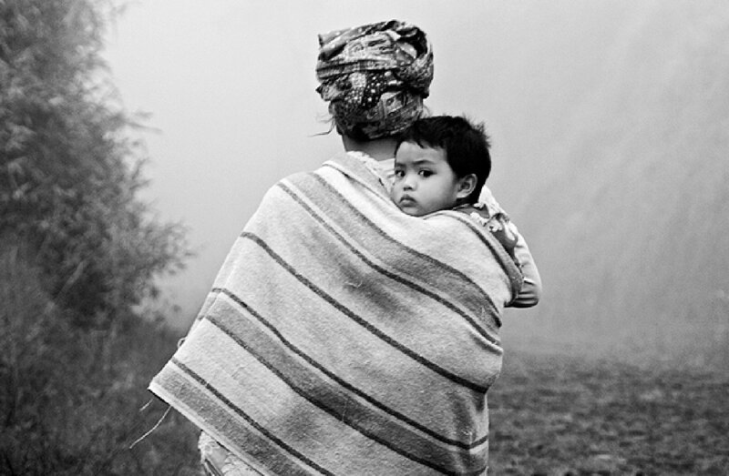 Woman Carrying Child — Black