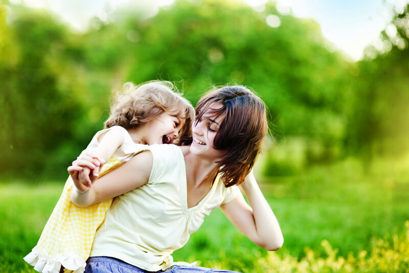 Woman Carrying Child — Green