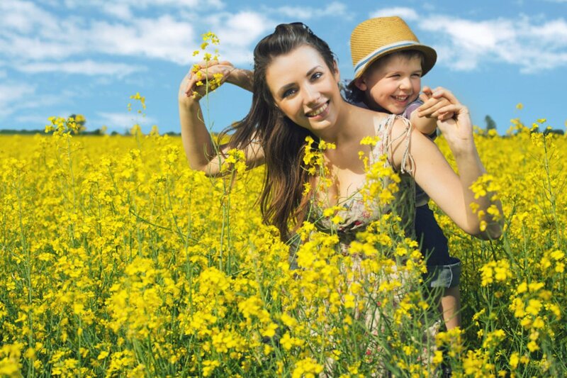 Woman Carrying Child — Yellow