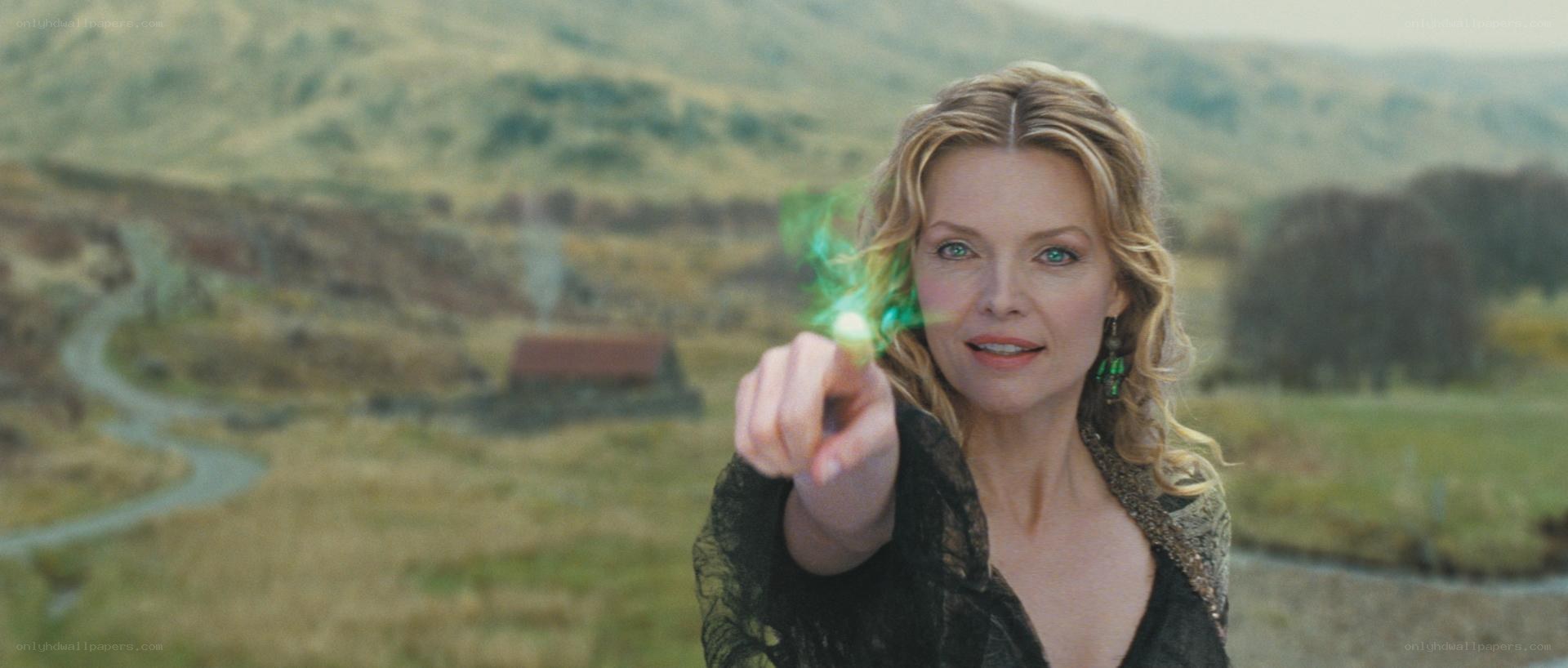 woman casting spell in landscape