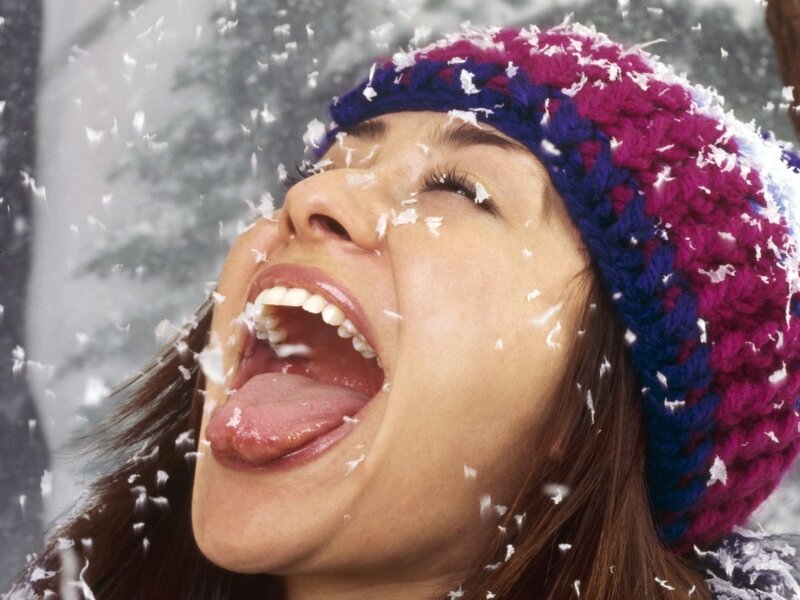 Woman Catching Snow