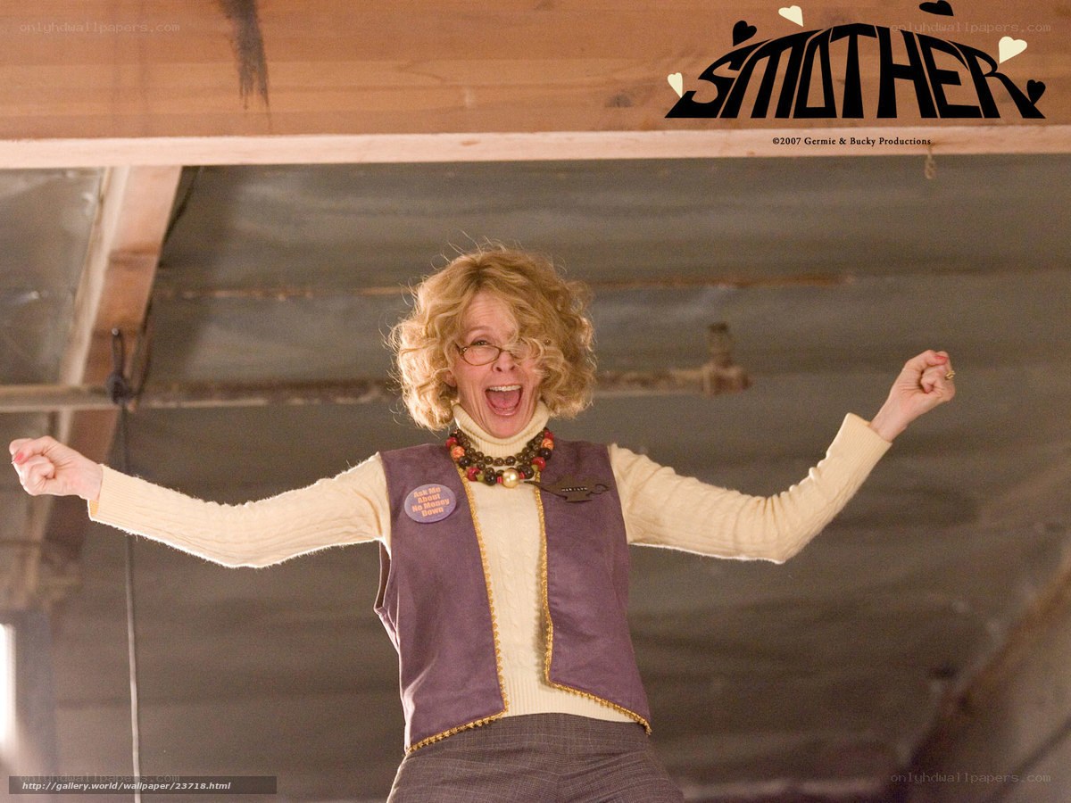 woman celebrating in purple vest