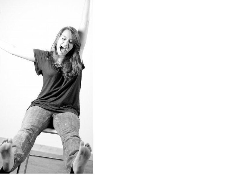 woman celebrating on chair