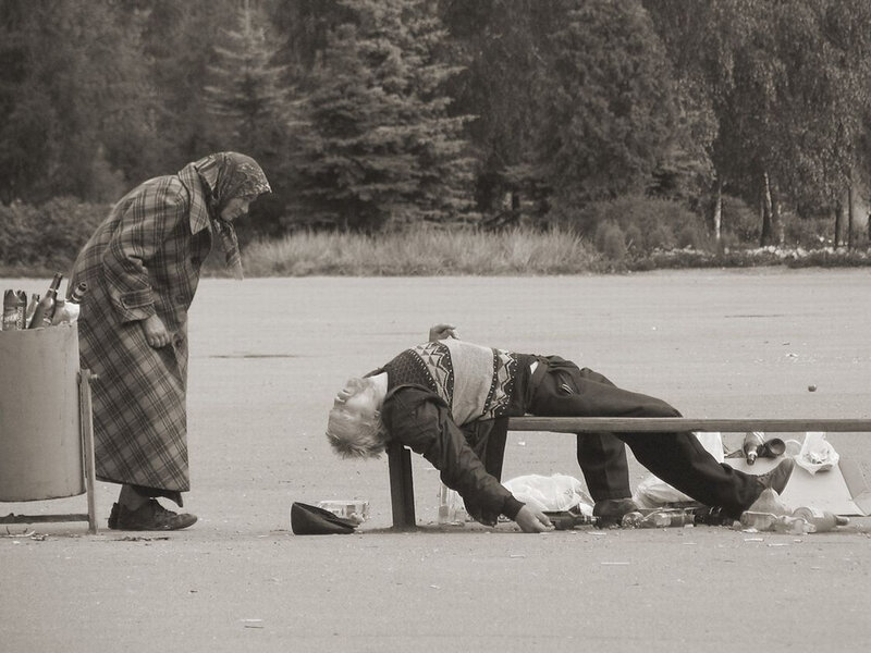 Woman checks on sleeping man