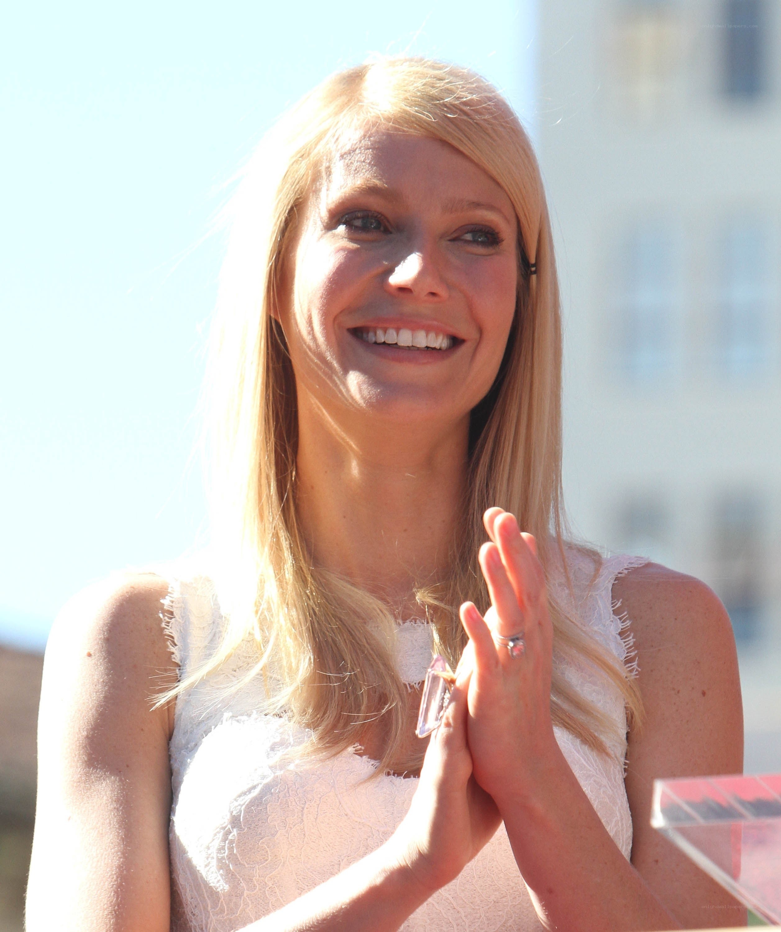 woman clapping at event