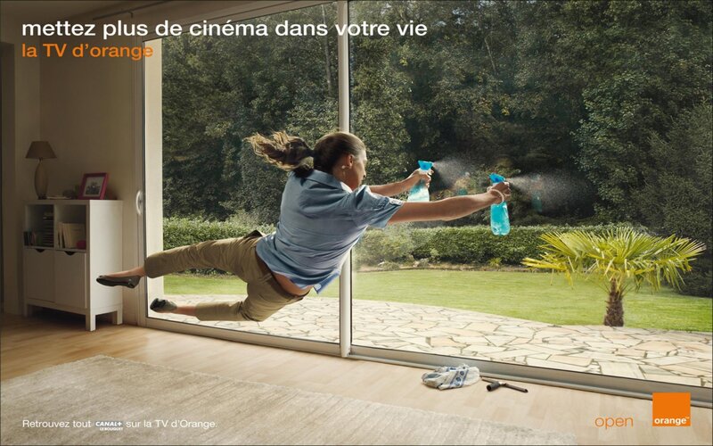 woman cleaning glass door
