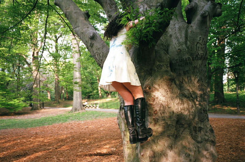 Woman Climbing Tree — Green
