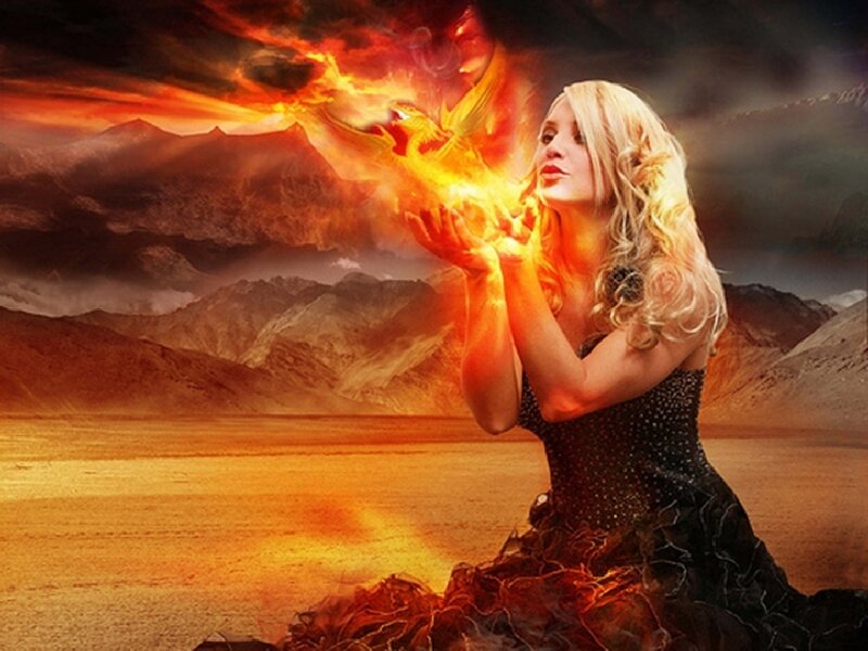 woman conjuring fire phoenix