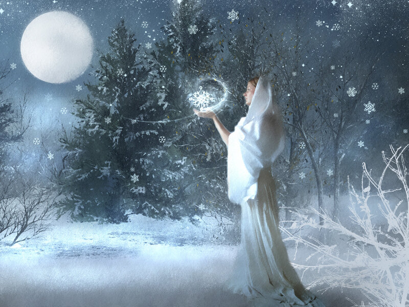 woman conjuring snowflake in winter