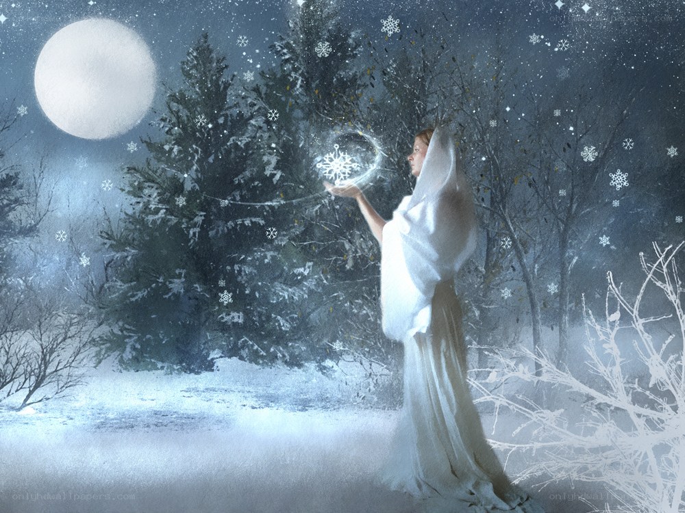 woman conjuring snowflake in winter
