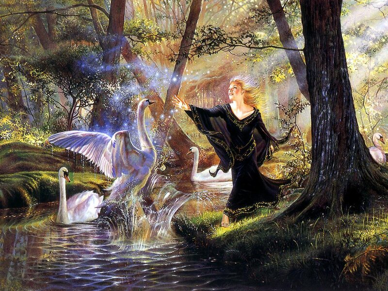 Woman conjuring swans in a forest
