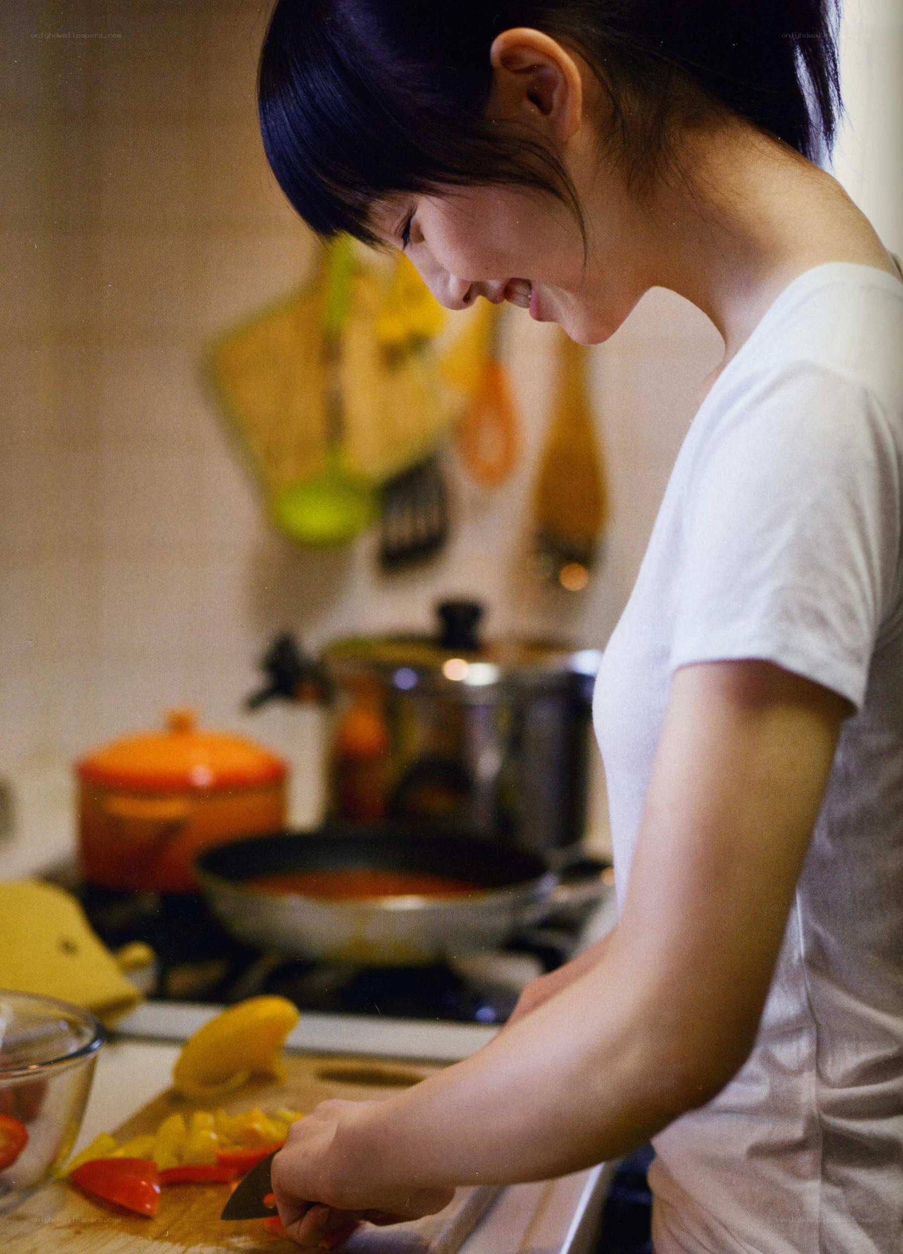 woman cooking in kitchen