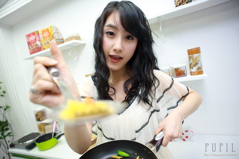 Woman Cooking in Kitchen — White, Casual