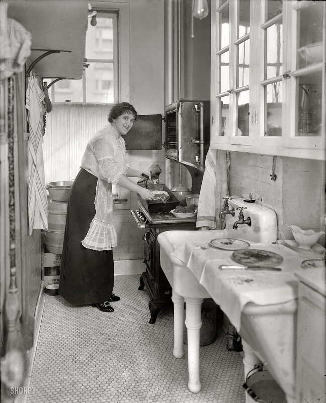 Woman cooking in vintage kitchen