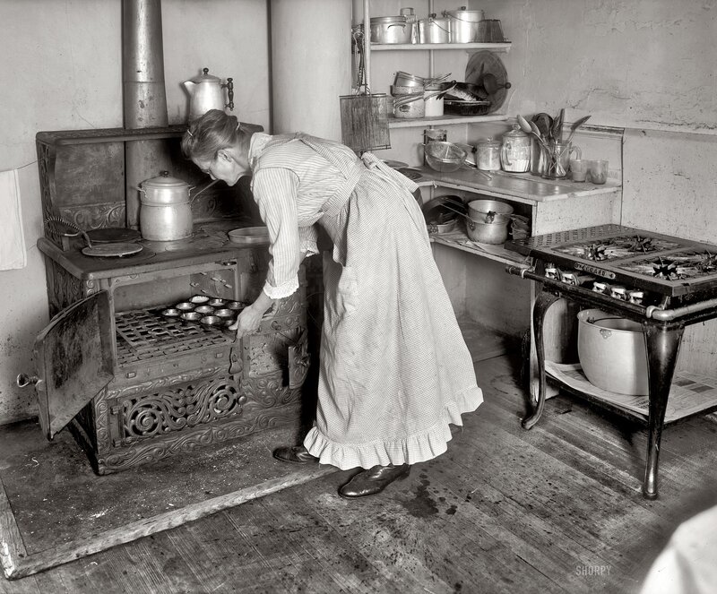 Woman cooking in vintage kitchen